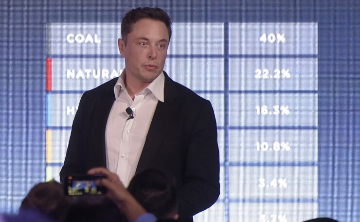 Elon Musk, co-founder and chief executive officer of Tesla Inc., speaks during an event at the Hornsdale wind farm, operated by Neoen SAS, near Jamestown, South Australia, on Friday, Sept. 29, 2017