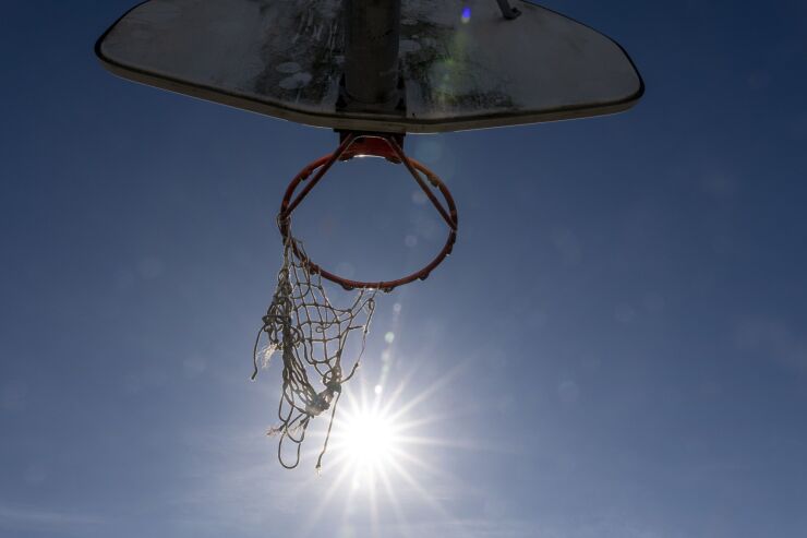 Basketball Hoop And Ripped Net