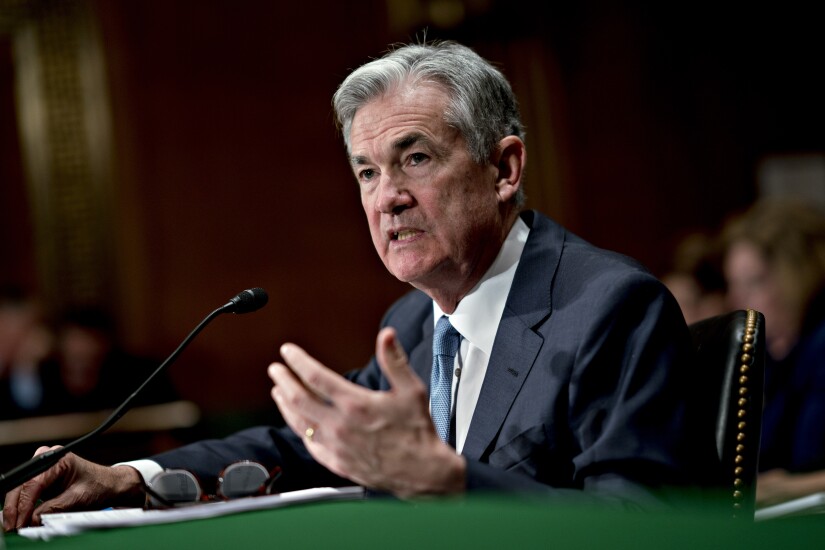 Federal Reserve Board Chair Jerome Powell addresses the Senate Banking Committee