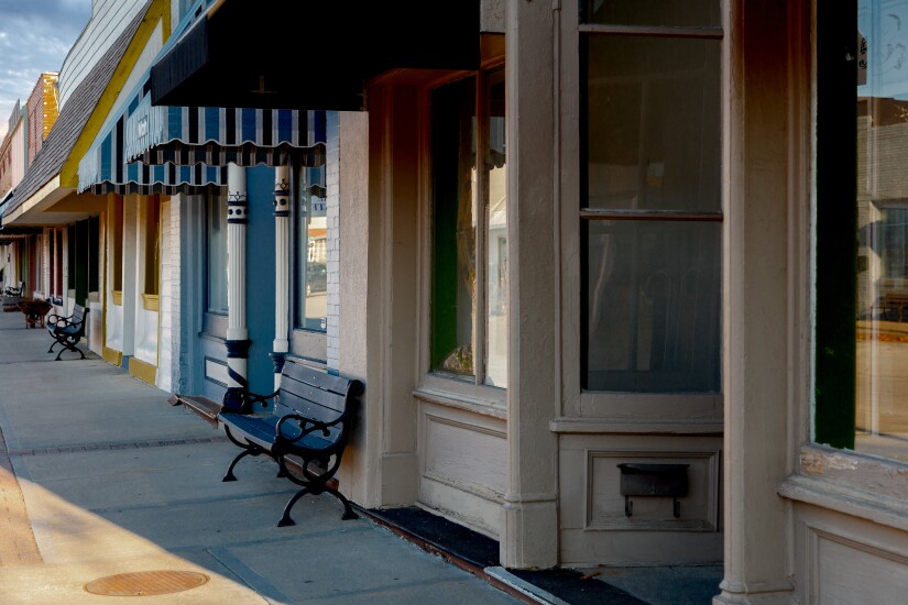 Image of storefronts along a small-town main street.