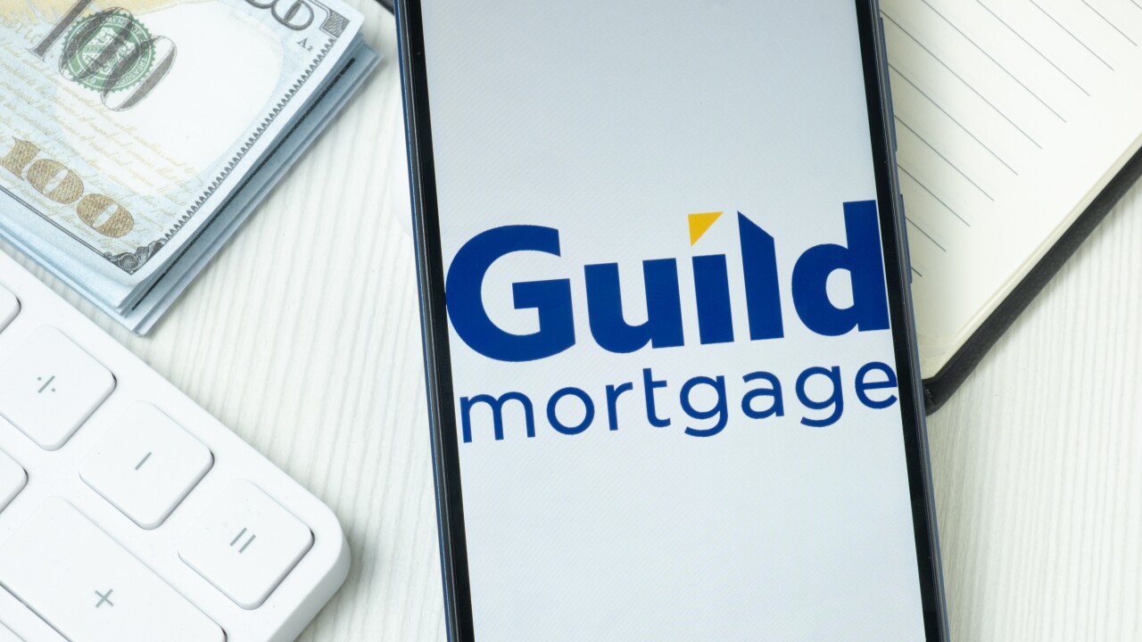New York, USA - 21 June 2024: Guild Mortgage Logo on Phone Screen, Company Icon
