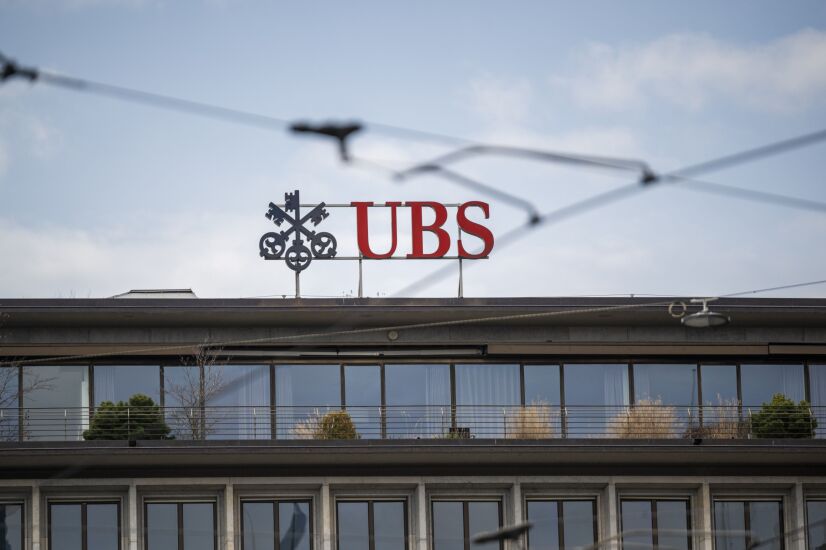 UBS hires Moelis banker Bloomberg roundup slide