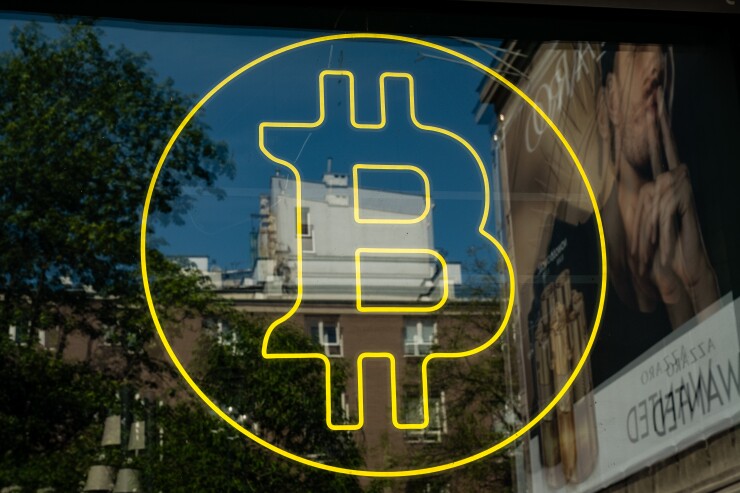 A Bitcoin cryptocurrency logo in Warsaw, Poland.