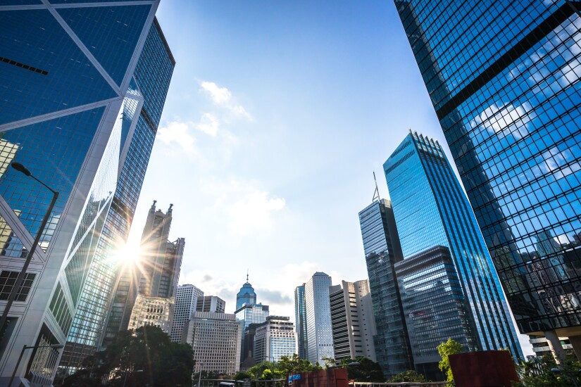 View of several tall buildings on a sunny day.