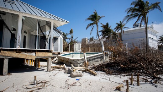 A damaged pool and house in Boca Grande on Gasparilla Island, Florida