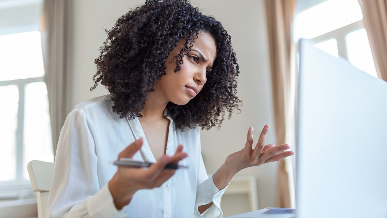 Woman frustrated while searching for jobs.