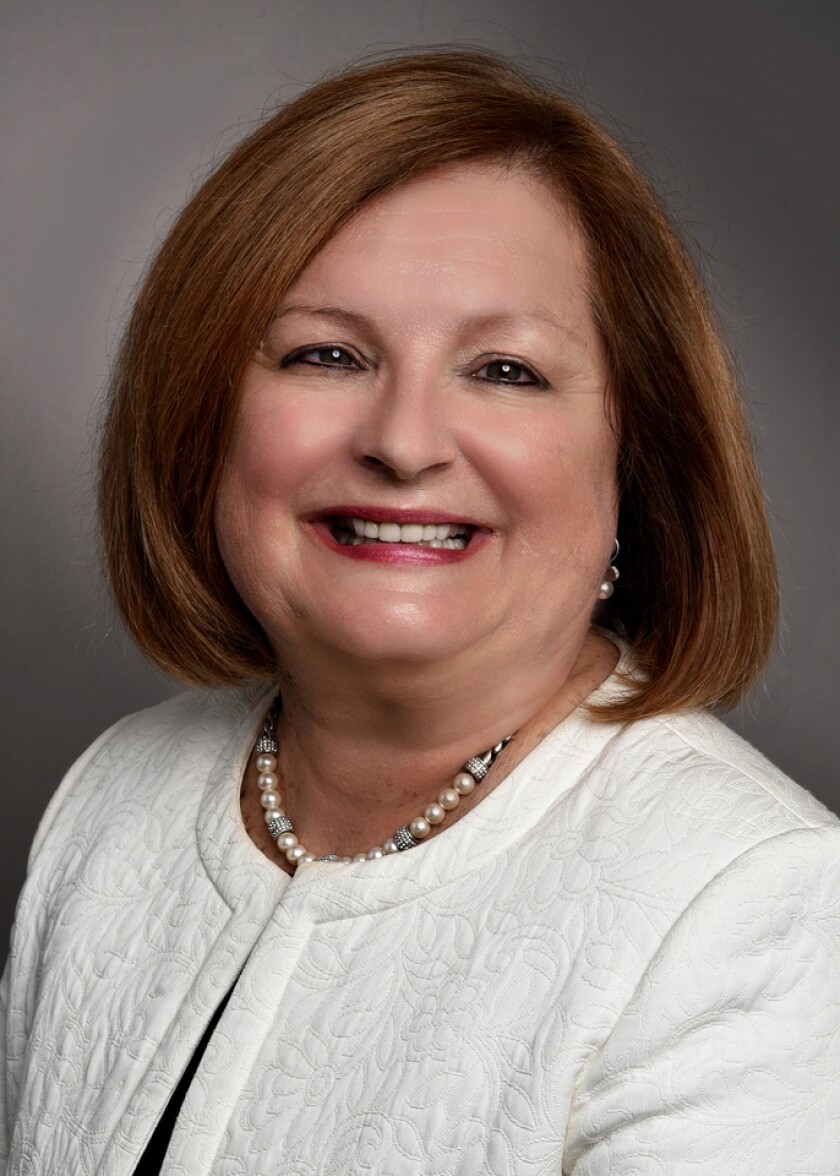 Portrait of Patti Clement, executive vice president of HUB International