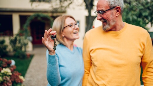 seniors_in_front_of_new_home-adobestock.jpg