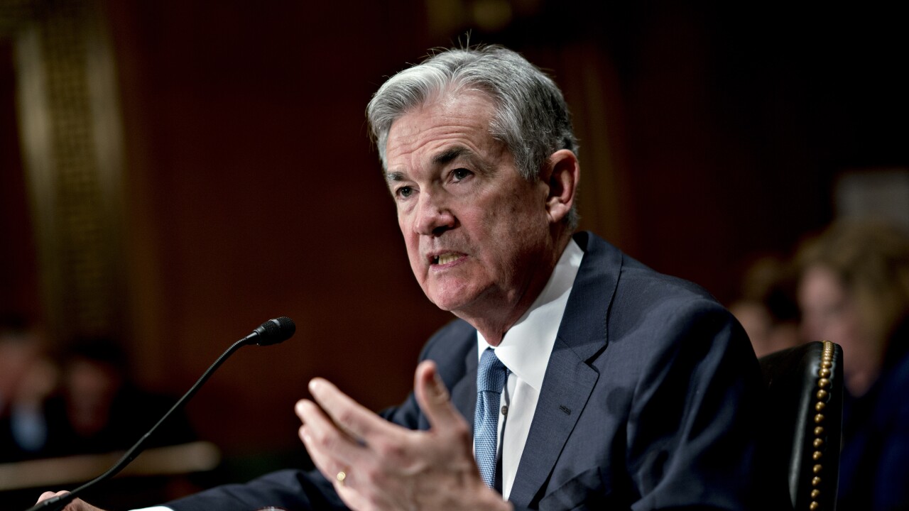 Federal Reserve Board Chair Jerome Powell addresses the Senate Banking Committee