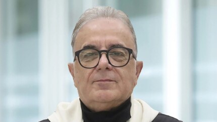 Headshot of Reza Rooholamini