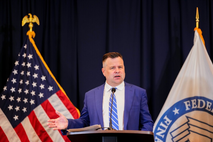 Pulte moves to cut credit score costs