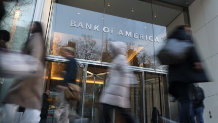 A picture of people walking by Bank of America's headquarters in New York City.