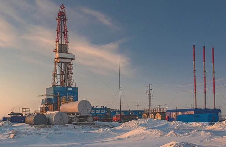 A drilling rig for oil and gas sits on the ice in the Arctic region. Pro-and anti- fossil fuel advocates have strong views on whether to finance companies drilling in the region.