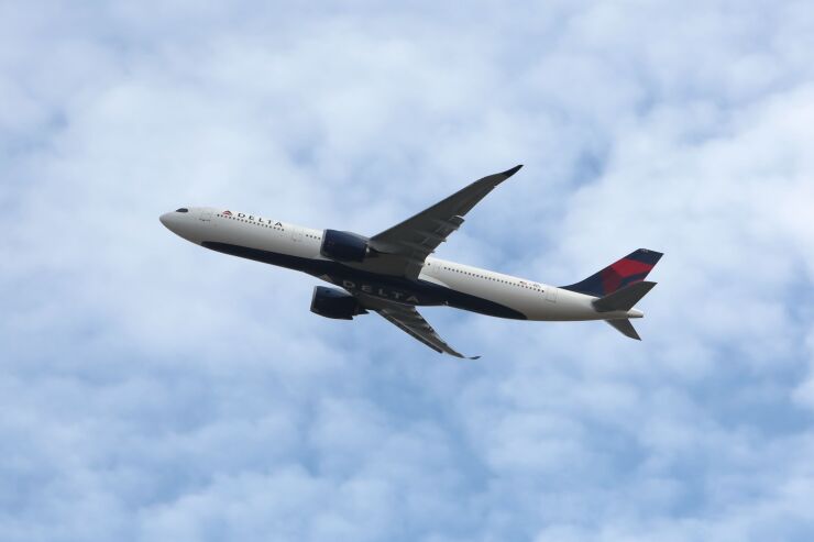An Airbus SE A330-941 passenger aircraft, operated by Delta Air Lines Inc., takes off from Blagnac Airport in Toulouse, France, on Tuesday, Feb. 15, 2022. Airbus sees the Asia-Pacific region needing more than 17,600 new planes over the next two decades as travel rebounds from the coronavirus pandemic and older and less fuel-efficient models need replaced. Photographer: Matthieu Rondel/Bloomberg