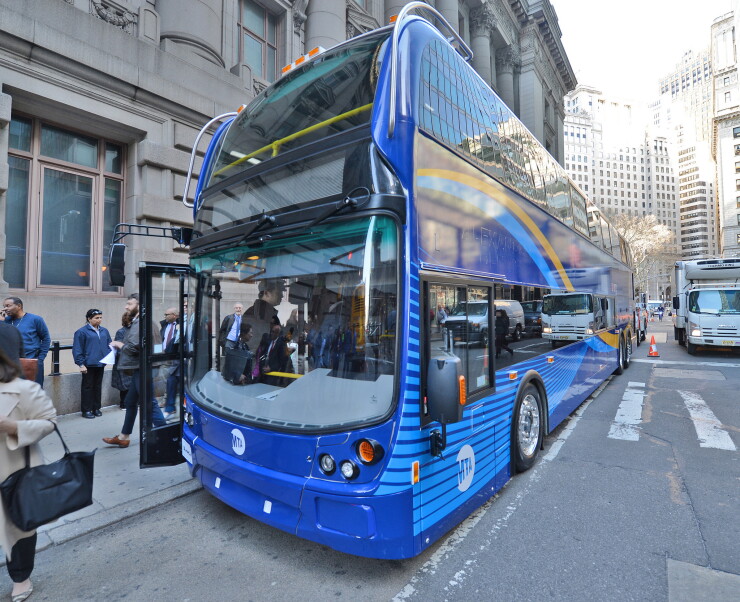 In conjunction with the announcement of MTA New York City Transit's Bus Plan, a new double-decker "SuperLo" bus, earmarked for express routes, and two all-electric local buses were put on display in front of MTA Headquarters on Mon., April 23, 2018.