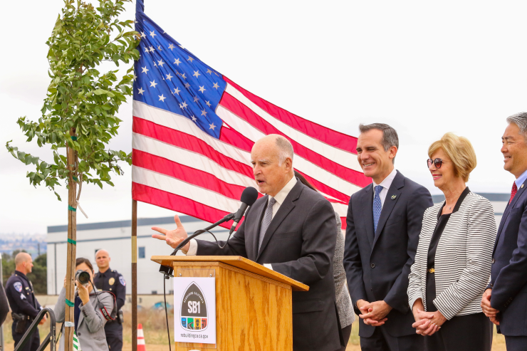 California Gov. Jerry Brown speaks at a groundbreaking ceremony for a transit station in Torrance that would be funded with money from the SB 1 gas tax.