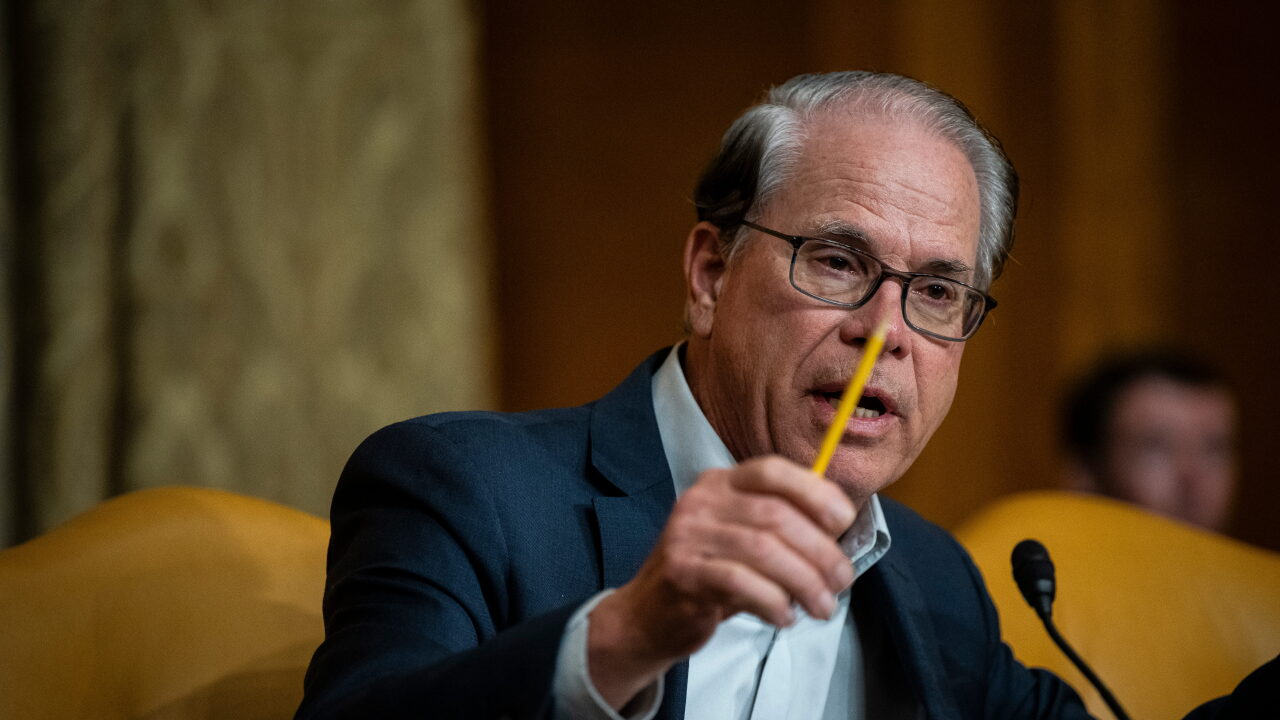 Indiana Gov. Mike Braun holding pencil