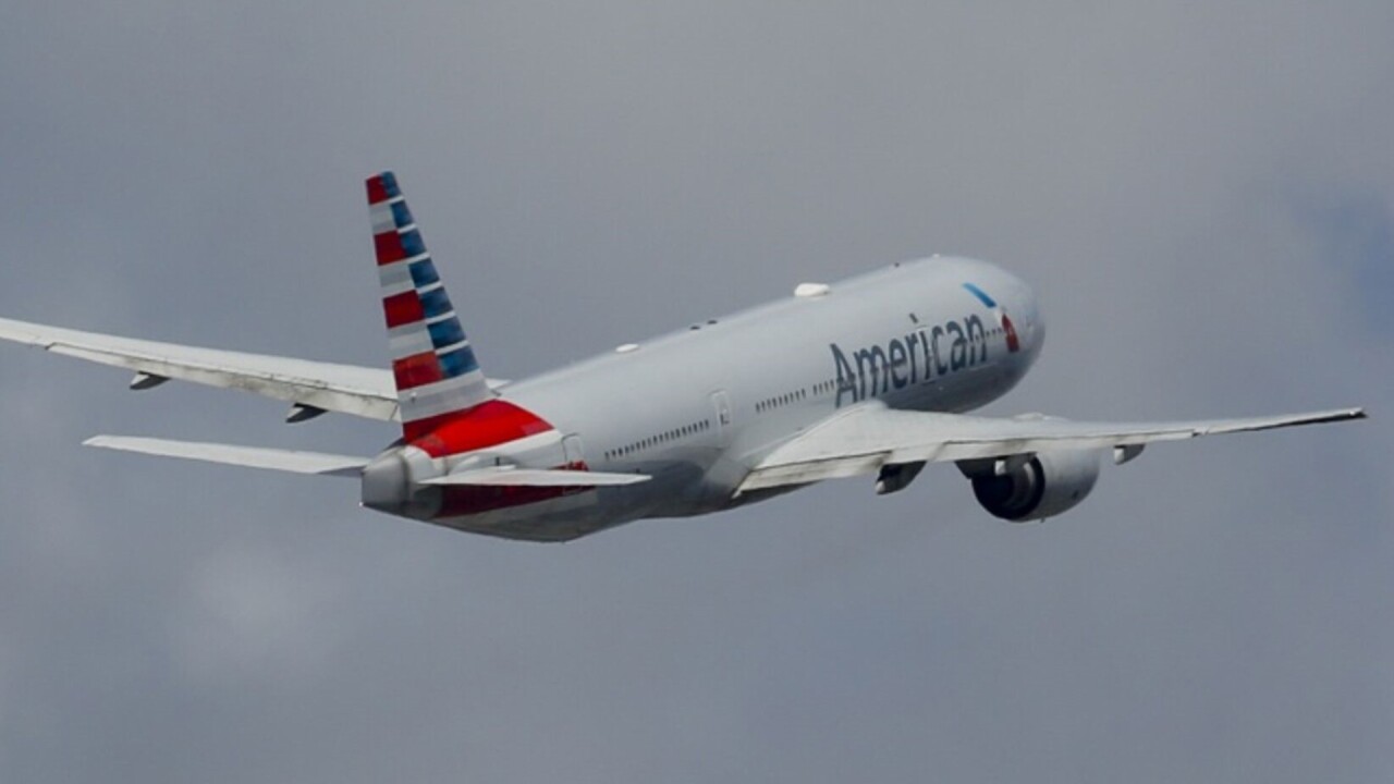 An American Airlines plane takes off from Miami International Airport