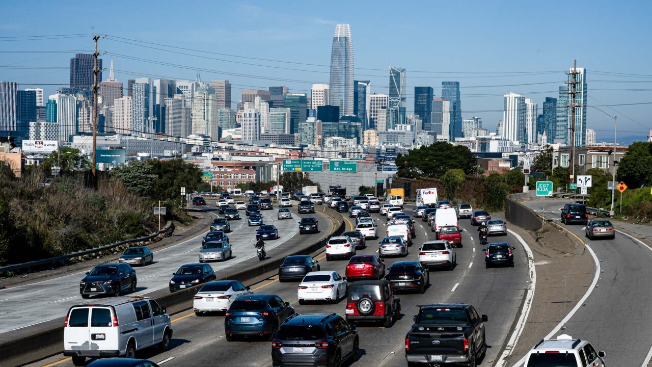 Traffic on U.S. Highway 1 in San Francisco, with city skyline in background