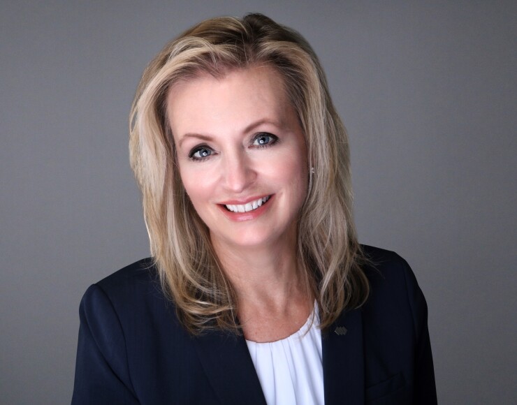 Jane Allerman-Rey, Spencer Savings