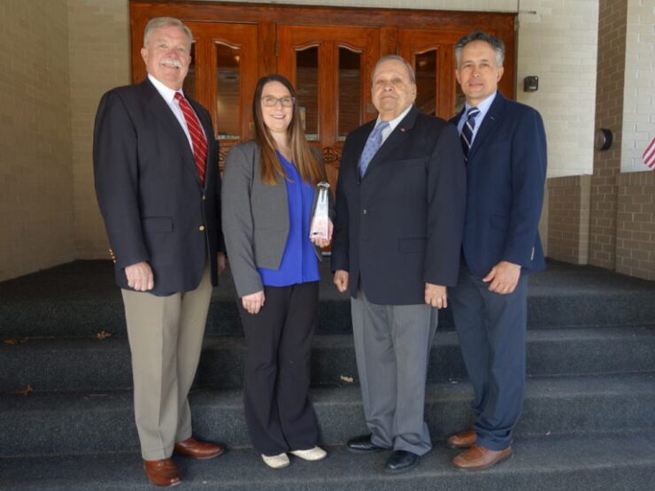Hanscom Federal Credit Union representatives pose with the 2019 Diamond Award the CU received for its direct mail campaign. From left: David Sprague, president and CEO; Amanda Delorme, database marketing manager; Paul Marotta, chairman of the board; and Steve Silva, VP of marketing.