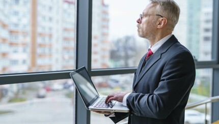 Businessman looking thoughtful