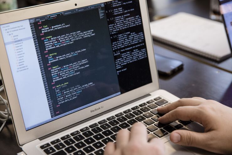A student uses a laptop at Le Wagon coding boot camp in Paris, France, on Monday, Jan. 22, 2018. Boris Paillard, who once developed equity and rates models at HSBC’s Paris office, is now co-founder of Le Wagon, a 9-week $8,000 boot camp that teaches computer code to a growing number of bankers, consultants and marketing types. Photographer: Marlene Awaad/Bloomberg