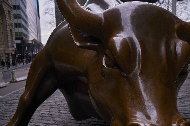 Close up photo of Charging Bull statue Wall Street