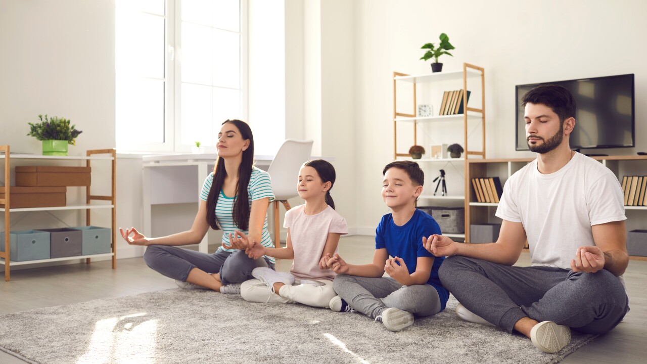 Family doing yoga together