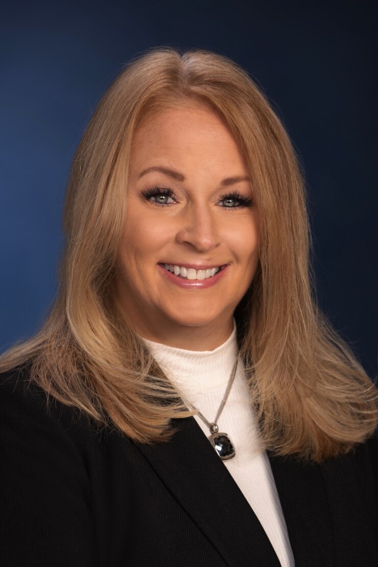 Andrea White, CEO of Naveo Credit Union