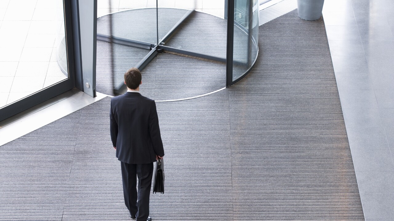 revolving-door-office-building-adobe.jpg