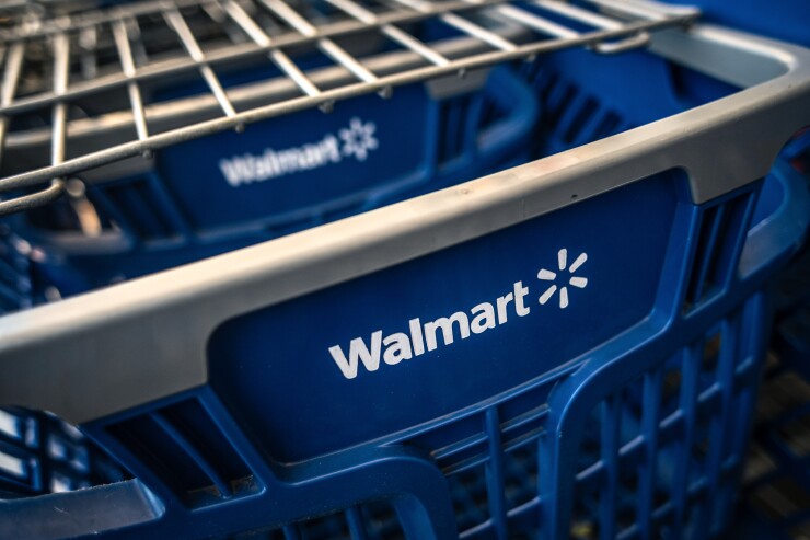 Blue shopping carts at a Wal-Mart de Mexico SAB store in Mexico City, Mexico