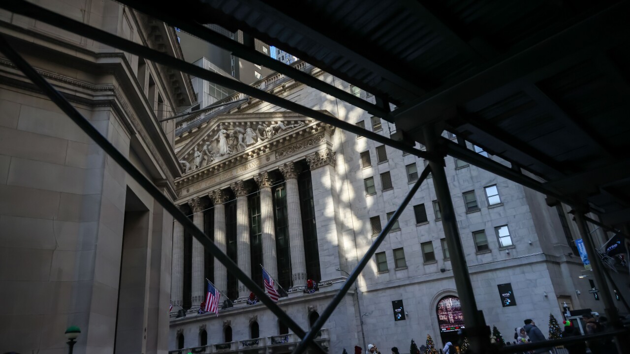 A Bloomberg News image displays the New York Stock Exchange on Wall Street in New York City in December 2025.