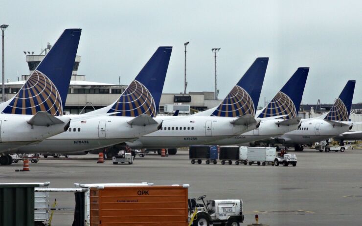 Continental jets are parked on the tarmac at Cleveland Hopkins International airport in Cleveland, Ohio, U.S., on Wednesday, May 12, 2010.