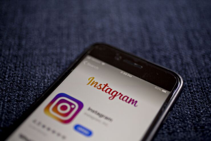 Facebook Inc.s Instagram application is displayed in the App Store on an Apple Inc. iPhone in an arranged photograph taken in Arlington, Virginia, U.S. on Monday, April 29, 2019. Facebook's sales gains are increasingly being driven by photo-sharing app Instagram and advertising in its Stories feature, a Snapchat copycat. Photographer: Andrew Harrer/Bloomberg