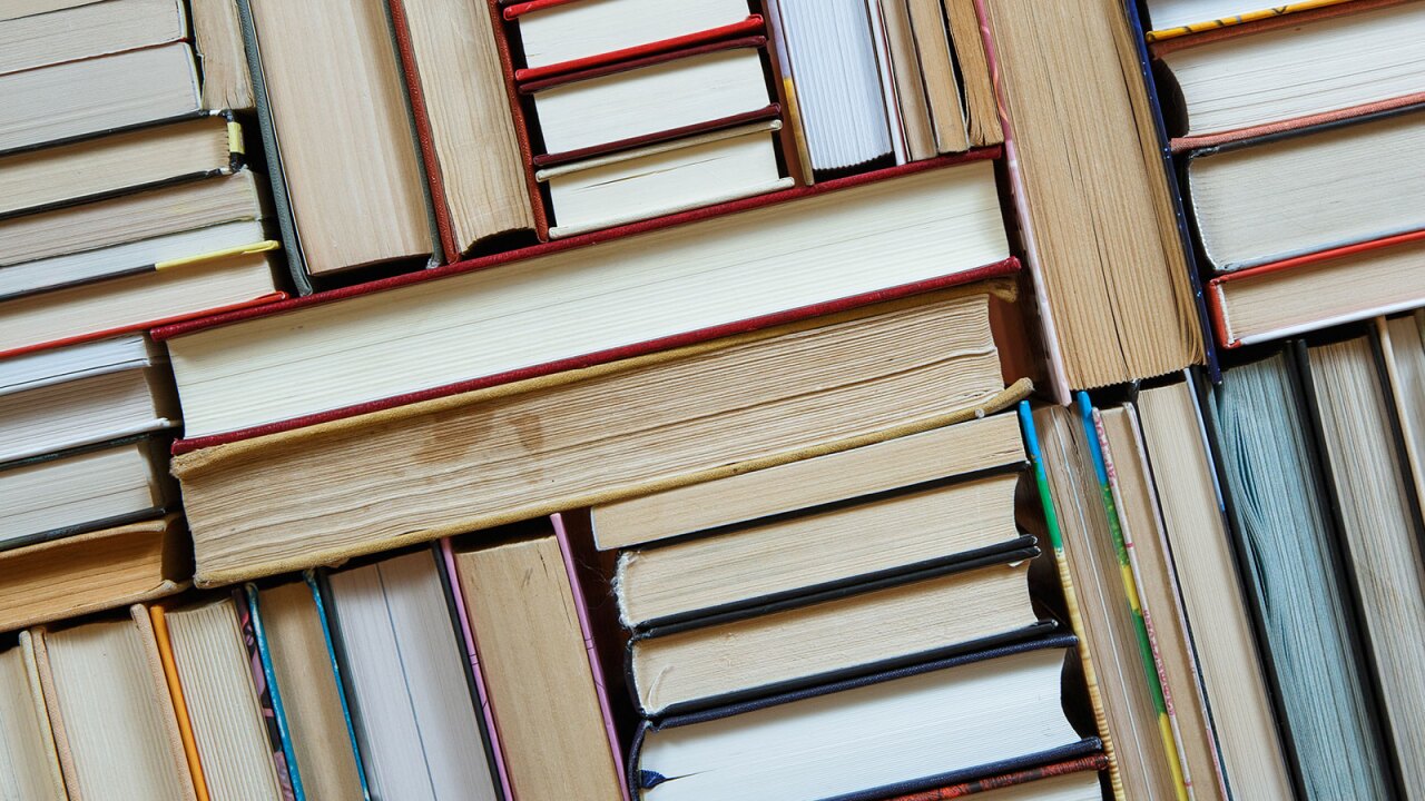 Books stacked in a grid.