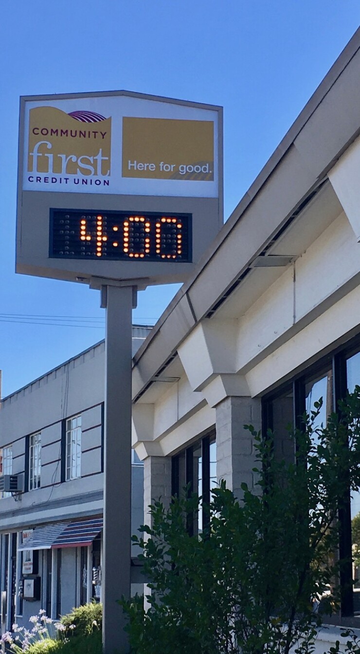 What had been the Ukiah, Calif., headquarters of Mendo Lake Credit Union now sports signage from Community First Credit Union.