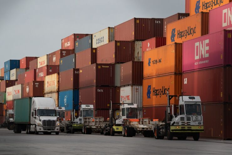 As cargo ships pile up as they wait to be landed, the returns of millions of taxpayers hang in the balance at the IRS.