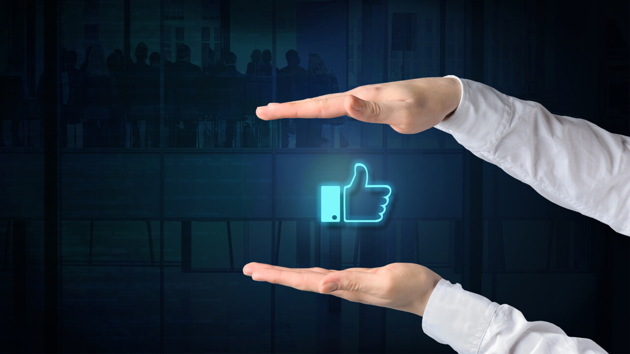 Concept showing reputation management, with two hands on either side of a thumbs up symbol.
