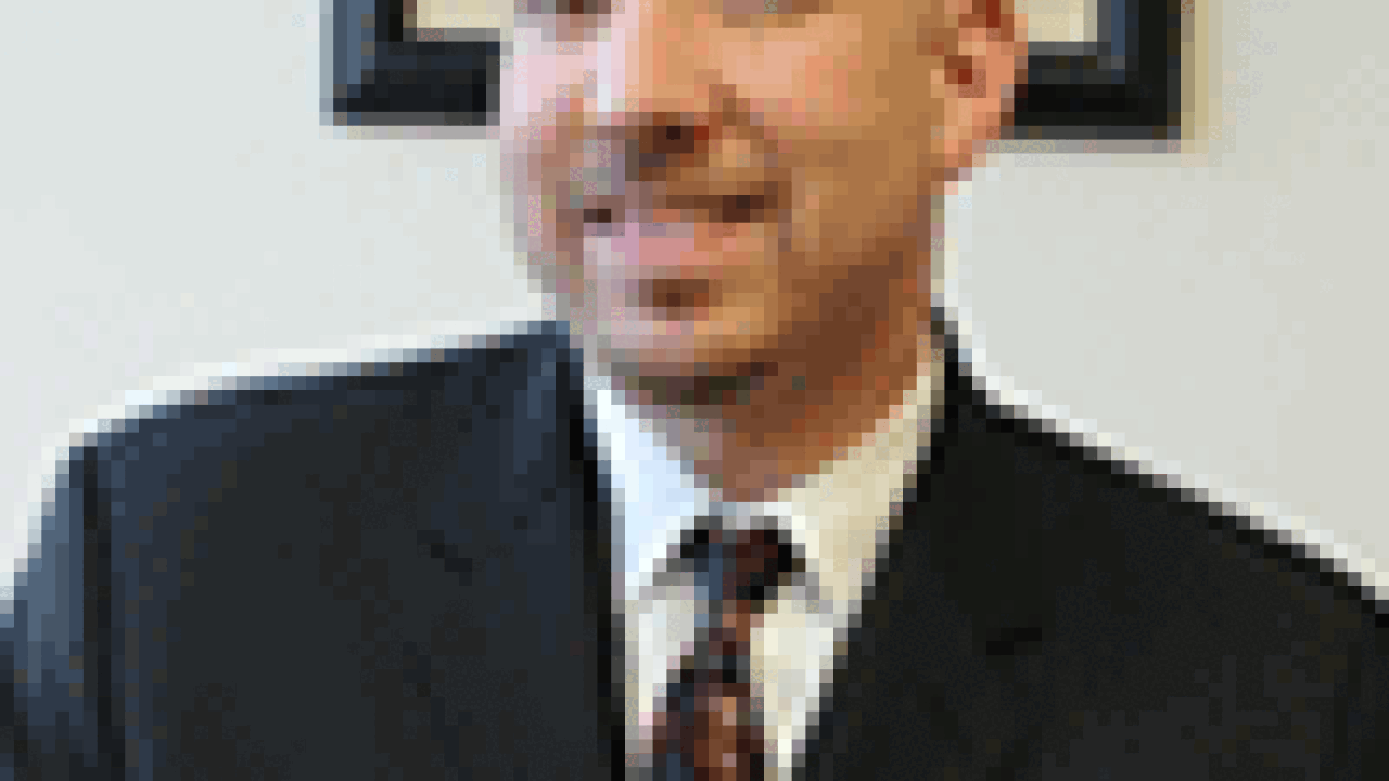 markstone-picture100x133.gif