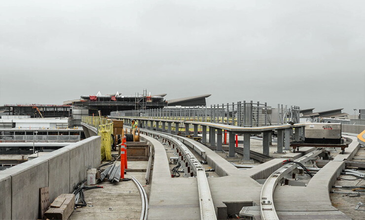 Construction of people mover guideway at Los Angeles International Airport.