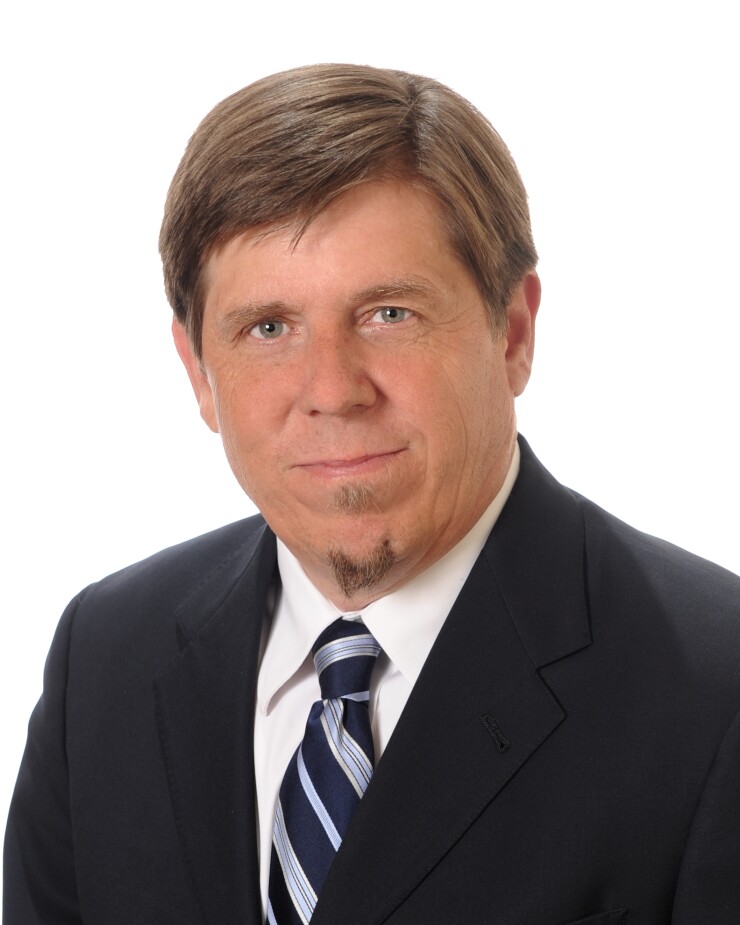 Tom Roseen Lipper Reuters