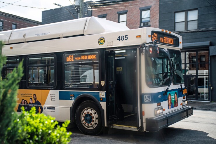 A B61 bus stops on Van Brunt Street in the Red Hook neighborhood of the Brooklyn borough of New York, U.S., on Monday, May 20, 2019