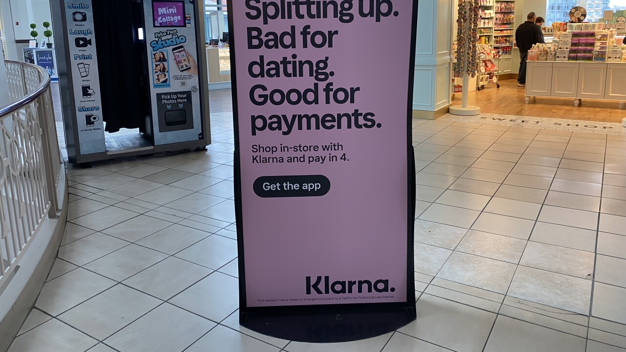 An ad for Klarna in a shopping mall.