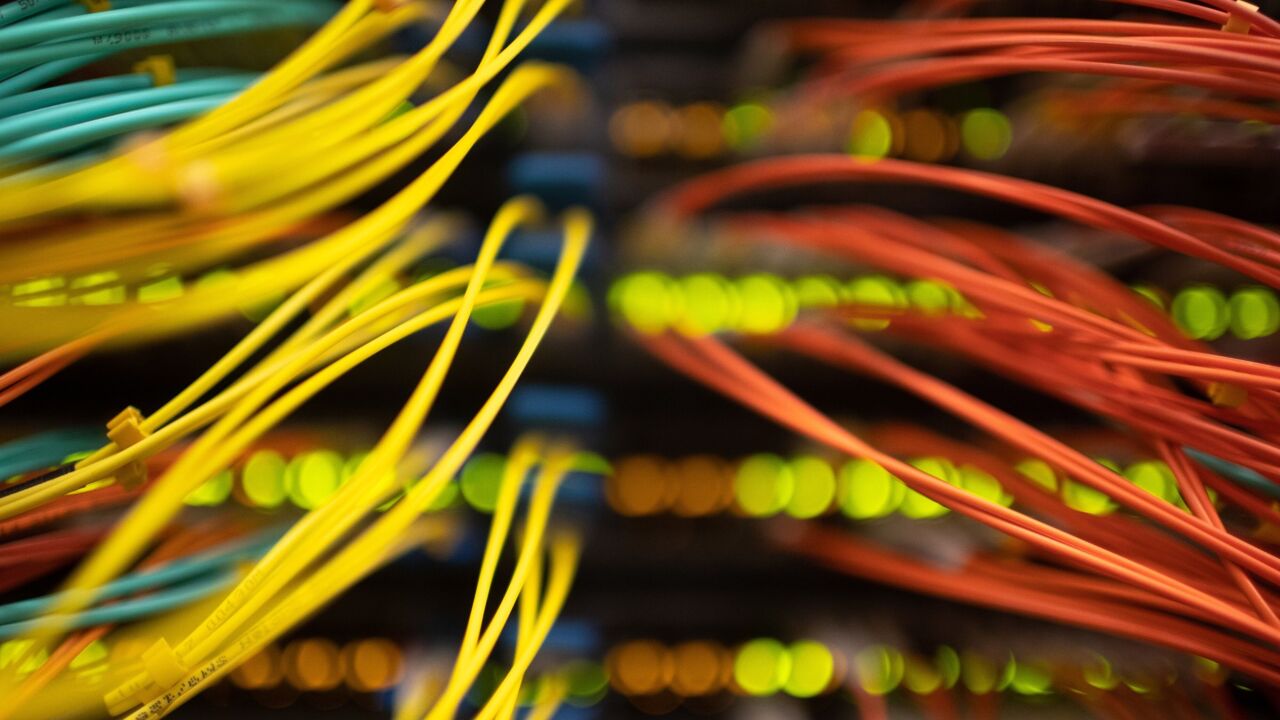 Multi-colored cables connected to a server Photographer: Andrey Rudkov/Bloomberg
