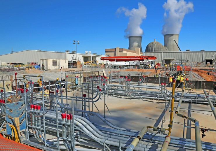 Steam rises from two nuclear reactors’ cooling towers at Georgia’s Plant Vogtle, which began operating in 1987 and 1989 and are partly owned by MEAG Power.