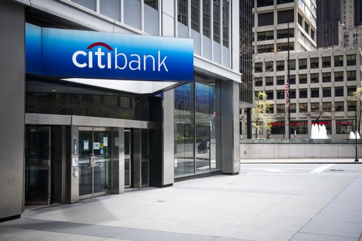 An empty sidewalk is seen in front of a Citigroup Inc. Citibank branch in New York, U.S., on Friday, April 10, 2020. Citigroup is scheduled to release earnings figures on April 15. Photographer: Mark Kauzlarich/Bloomberg