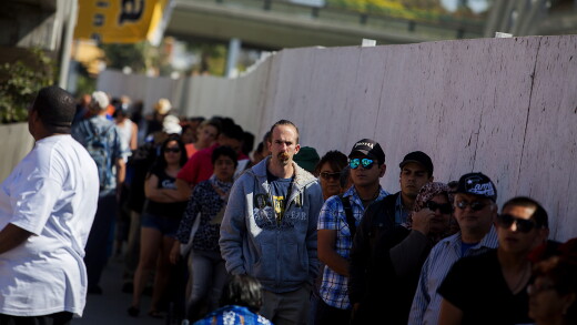 Line of immigrants at a border crossing