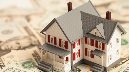 Single family house on pile of money