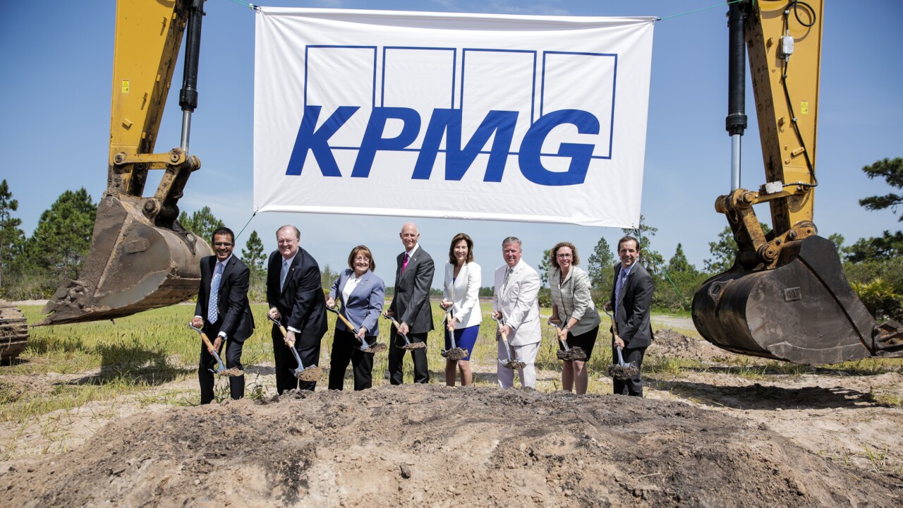 Florida Governor Rick Scott and KPMG CEO Lynn Doughtie break ground on KPMG's new training facility in Orlando